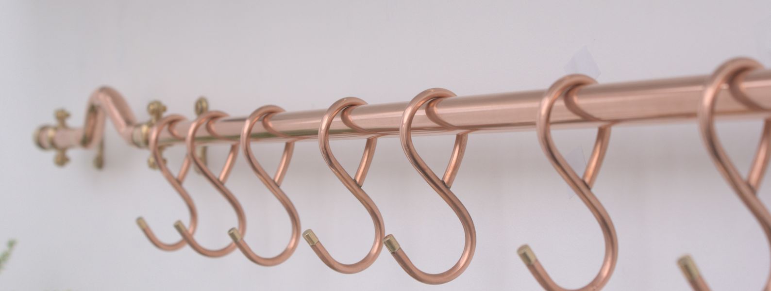 Set of handmade copper pan hooks for French farmhouse-style kitchen rack