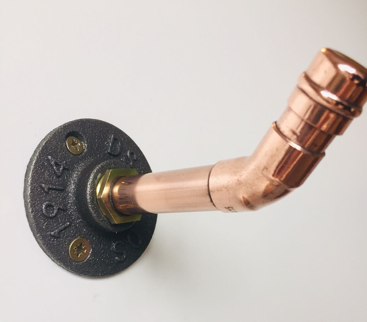 antique copper and cast iron coat hook