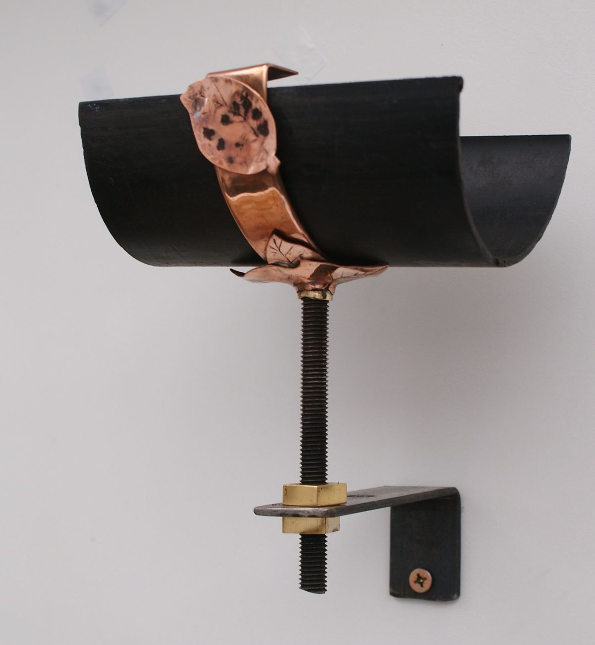 vintage style copper gutter fixing leaf pattern